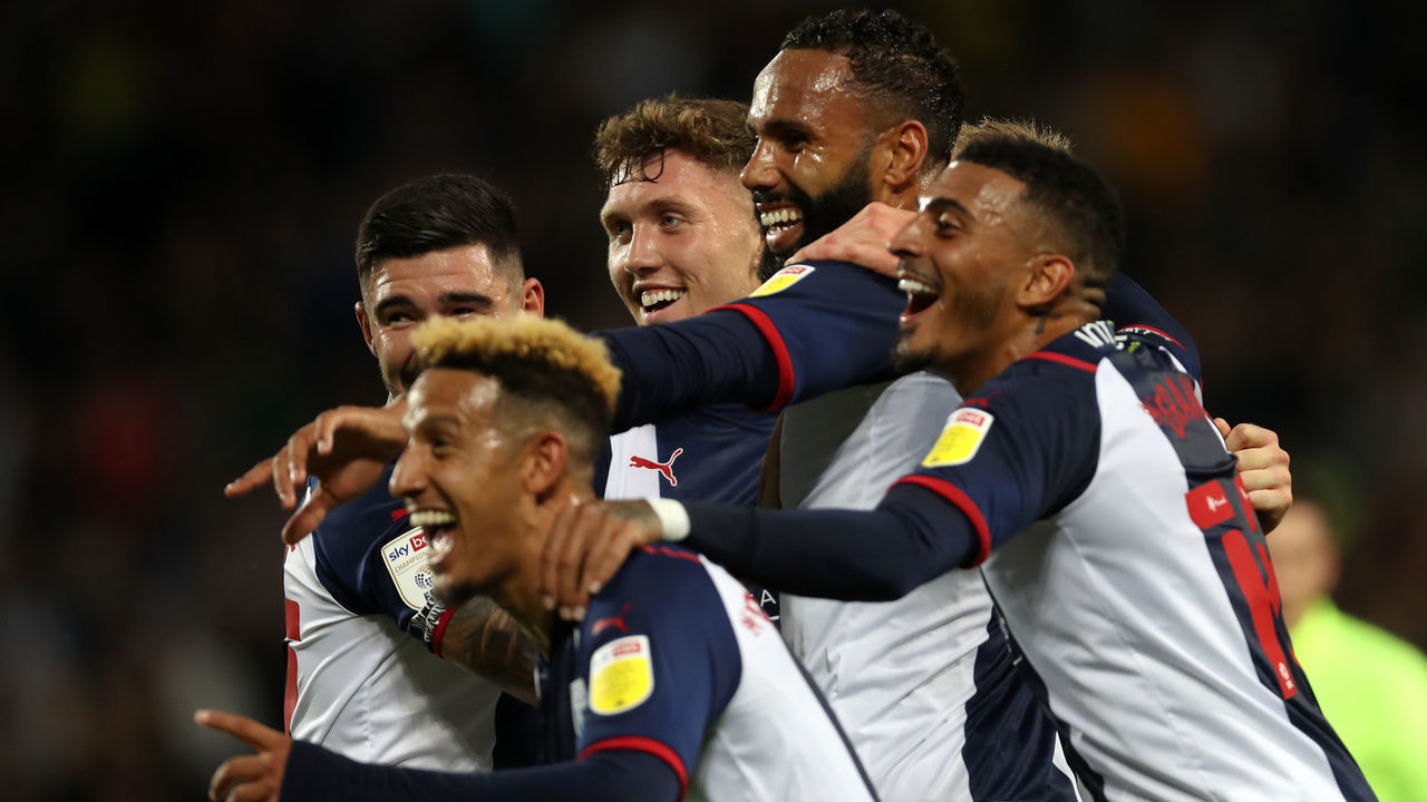 WEST BROMWICH, ENGLAND - AUGUST 18: WBA players celebrate after Jack Robinson of Sheffield United scored an own goal to make it 1-0 during the Sky Bet Championship match between West Bromwich Albion and Sheffield United at The Hawthorns on August 18, 2021 in West Bromwich, England.