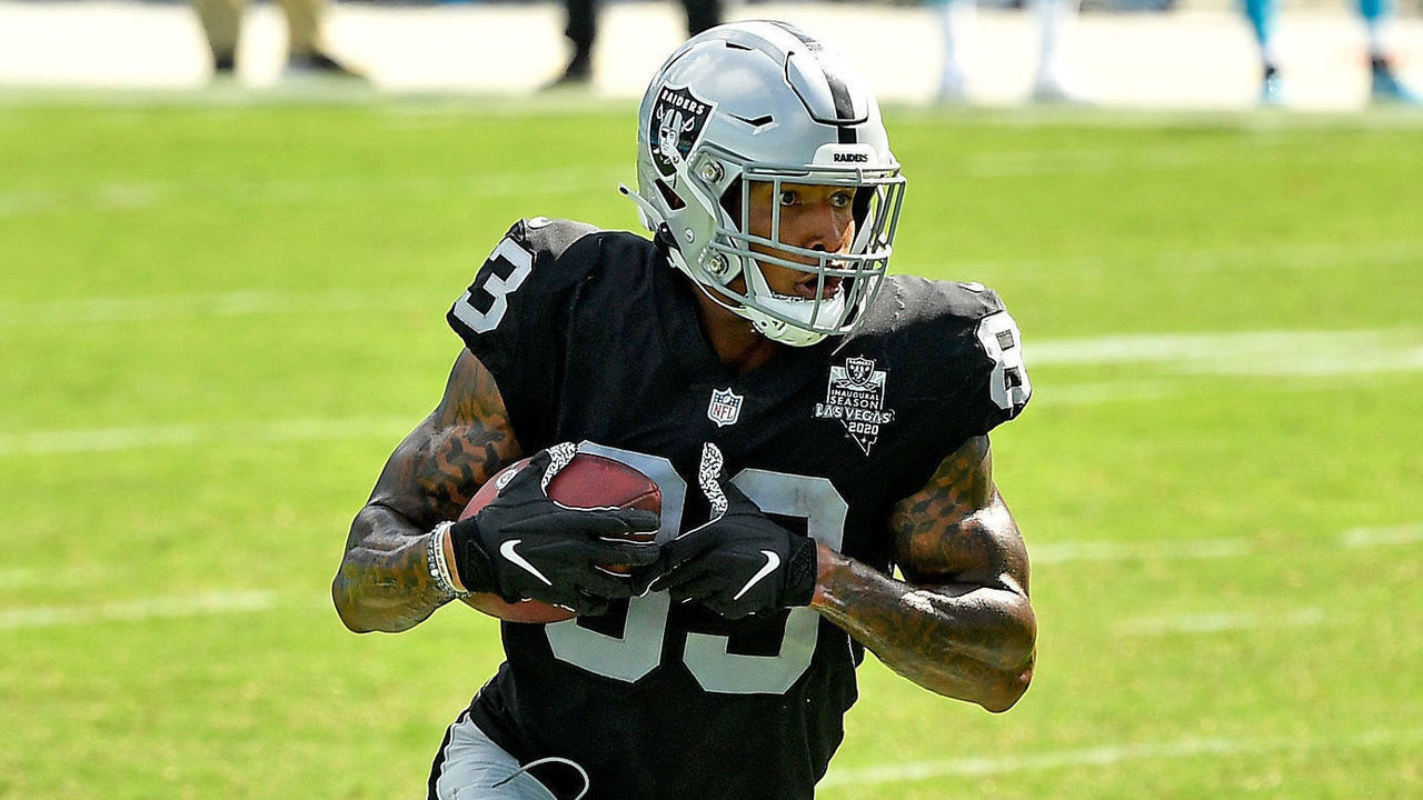 CHARLOTTE, NORTH CAROLINA - SEPTEMBER 13: Darren Waller #83 of the Las Vegas Raiders makes a catch against the Carolina Panthers during their game at Bank of America Stadium on September 13, 2020 in Charlotte, North Carolina. Las Vegas won 34-30.