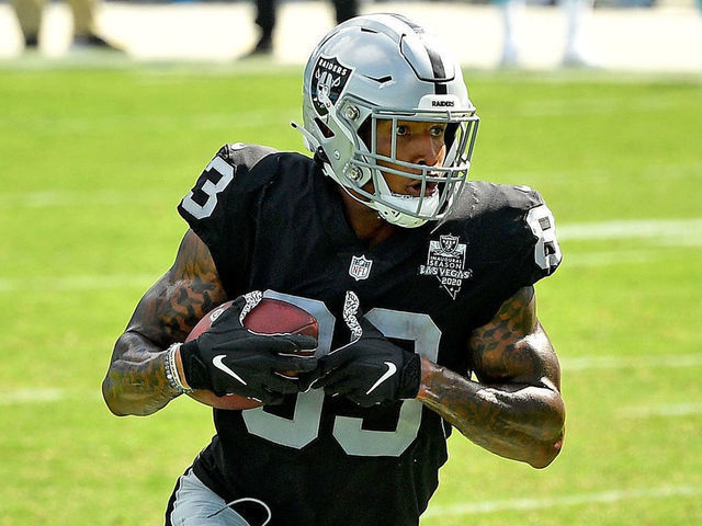 CHARLOTTE, NORTH CAROLINA - SEPTEMBER 13: Darren Waller #83 of the Las Vegas Raiders makes a catch against the Carolina Panthers during their game at Bank of America Stadium on September 13, 2020 in Charlotte, North Carolina. Las Vegas won 34-30.