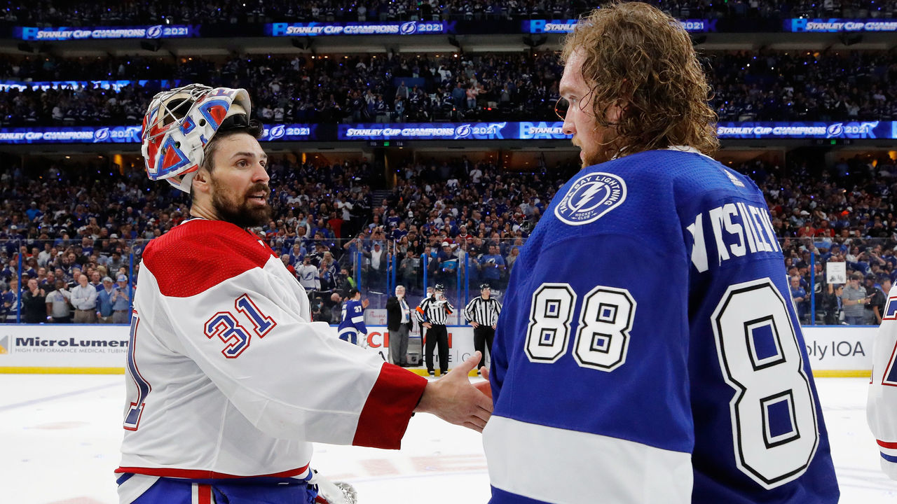 TAMPA, FLORIDA - JULY 07: Carey Price #31 of the Montreal Canadiens and Andrei Vasilevskiy #88 of the Tampa Bay Lightning shake hands following the Lightning's victory over the Montreal Canadiens in Game Five of the 2021 NHL Stanley Cup Final at the Amalie Arena on July 07, 2021 in Tampa, Florida. The Lightning defeated the Canadiens 1-0 to take the series four games to one.