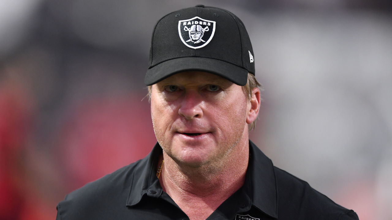 LAS VEGAS, NEVADA - AUGUST 14: Head coach Jon Gruden of the Las Vegas Raiders exits the field during a preseason game against the Seattle Seahawks at Allegiant Stadium on August 14, 2021 in Las Vegas, Nevada. The Raiders defeated the Seahawks 20-7.