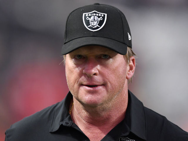 LAS VEGAS, NEVADA - AUGUST 14: Head coach Jon Gruden of the Las Vegas Raiders exits the field during a preseason game against the Seattle Seahawks at Allegiant Stadium on August 14, 2021 in Las Vegas, Nevada. The Raiders defeated the Seahawks 20-7.