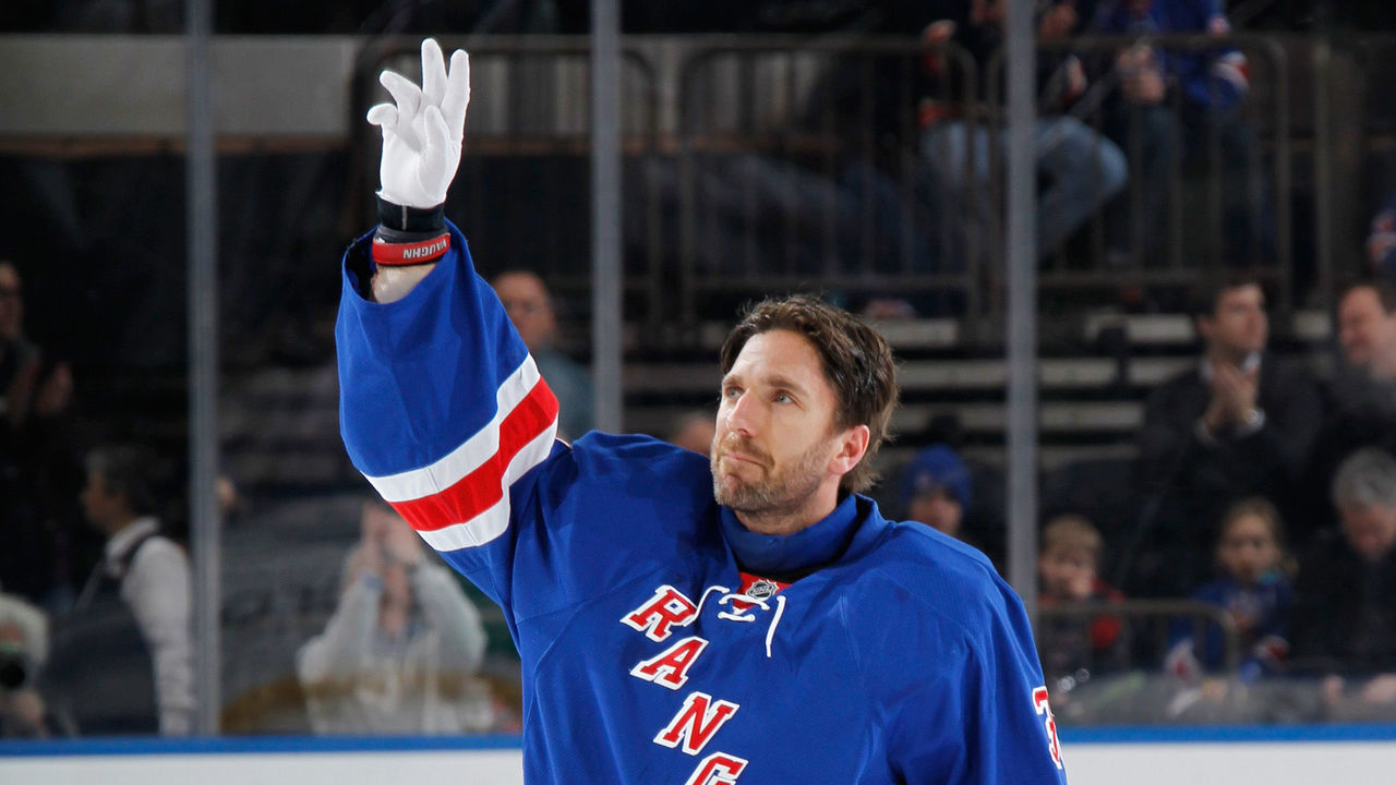 NEW YORK, NY - MARCH 24: Henrik Lundqvist #30 of the New York Rangers waves to the crowd after being honored as the new franchise leader in both wins and shutouts prior to the game against the Phoenix Coyotes at Madison Square Garden on March 24, 2014 in New York City.