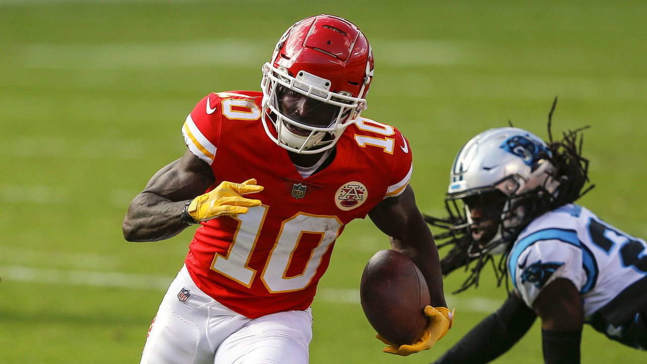 KANSAS CITY, MO - NOVEMBER 08: Tyreek Hill #10 of the Kansas City Chiefs runs past Donte Jackson #26 of the Carolina Panthers on a second quarter pass reception at Arrowhead Stadium on November 8, 2020 in Kansas City, Missouri.