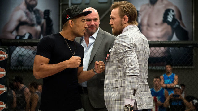 LAS VEGAS, NV - AUGUST 26: (R-L) UFC interim featherweight champion Conor McGregor and UFC featherweight Champion Jose Aldo face off during the filming of The Ultimate Fighter: Team McGregor vs Team Faber at the UFC TUF Gym on August 26, 2015 in Las Vegas, Nevada.