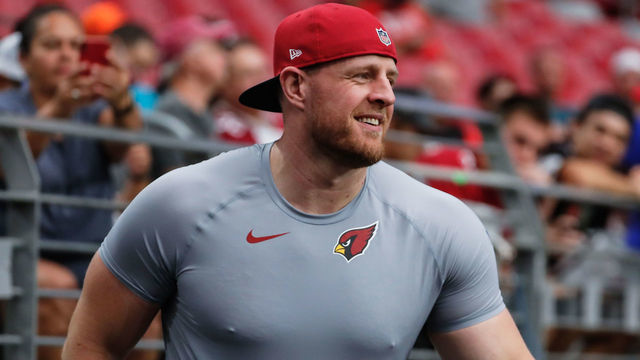 GLENDALE, AZ - AUGUST 04: Arizona Cardinals defensive end J.J. Watt (99) smiles on the sideline during Arizona Cardinals training camp on August 4, 2021 at State Farm Stadium in Glendale, Arizona