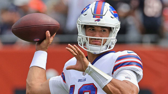CHICAGO, ILLINOIS - AUGUST 21: Mitchell Trubisky #10 of the Buffalo Bills participates in warm-ups before a preseason game against the Chicago Bears at Soldier Field on August 21, 2021 in Chicago, Illinois.