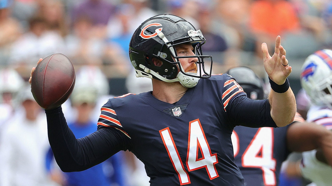 CHICAGO, ILLINOIS - AUGUST 21: Andy Dalton #14 of the Chicago Bears throws a touchdown pass against the Buffalo Bills during a preseason game at Soldier Field on August 21, 2021 in Chicago, Illinois.