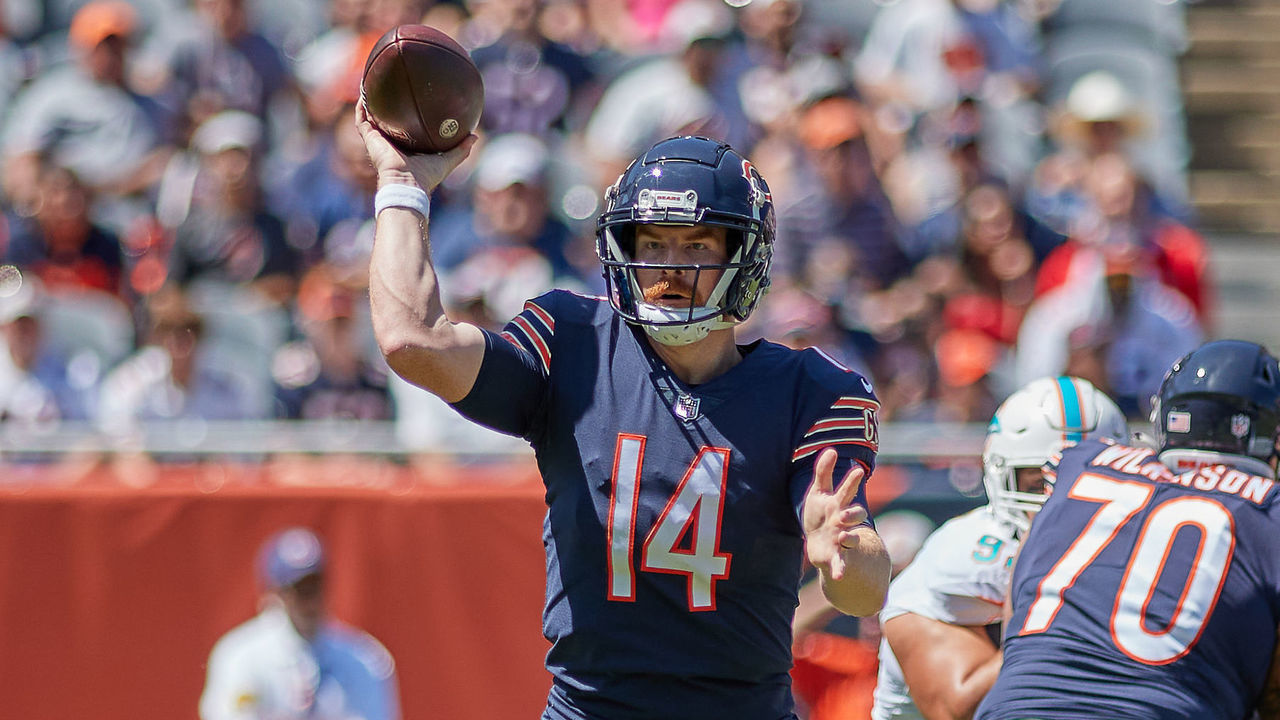 CHICAGO, IL - AUGUST 14: Chicago Bears quarterback Andy Dalton (14) throws the football during a preseason game between the Chicago Bears and the Miami Dolphins on August 14, 2021 at Soldier Field in Chicago, IL.