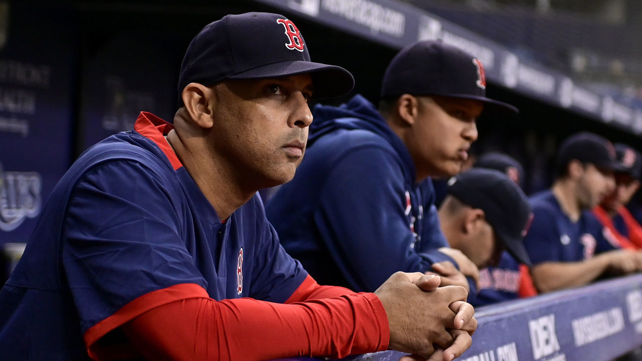 ST PETERSBURG, FLORIDA - JULY 30: Manager Alex Cora #13 of the Boston Red Sox looks on during the fourth inning against the Tampa Bay Rays at Tropicana Field on July 30, 2021 in St Petersburg, Florida.