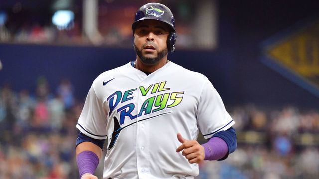 ST PETERSBURG, FLORIDA - AUGUST 21: Nelson Cruz #23 of the Tampa Bay Rays scores after being batted in by Wander Franco #5 in the first inning against the Chicago White Sox at Tropicana Field on August 21, 2021 in St Petersburg, Florida.