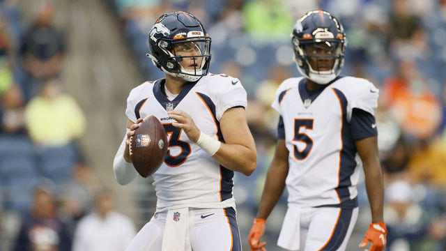 SEATTLE, WASHINGTON - AUGUST 21: Quarterback Drew Lock #3 and quarterback Teddy Bridgewater #5 of the Denver Broncos warm up during an NFL preseason game against the Seattle Seahawks at Lumen Field on August 21, 2021 in Seattle, Washington.