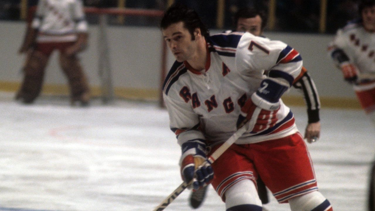 NEW YORK, NY - 1972: Rod Gilbert #7 of the New York Rangers skates on the ice during an NHL game against the Montreal Canadiens circa 1972 at the Madison Square Garden in New York, New York.