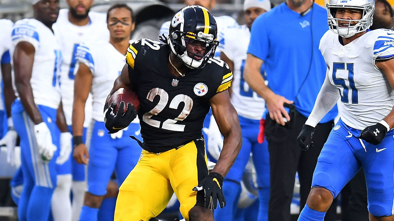 PITTSBURGH, PA - AUGUST 21: Najee Harris #22 of the Pittsburgh Steelers carries the ball in front of Jahlani Tavai #51 of the Detroit Lions during the first quarter at Heinz Field on August 21, 2021 in Pittsburgh, Pennsylvania.