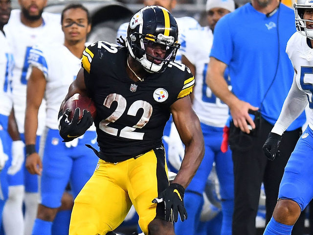 PITTSBURGH, PA - AUGUST 21: Najee Harris #22 of the Pittsburgh Steelers carries the ball in front of Jahlani Tavai #51 of the Detroit Lions during the first quarter at Heinz Field on August 21, 2021 in Pittsburgh, Pennsylvania.