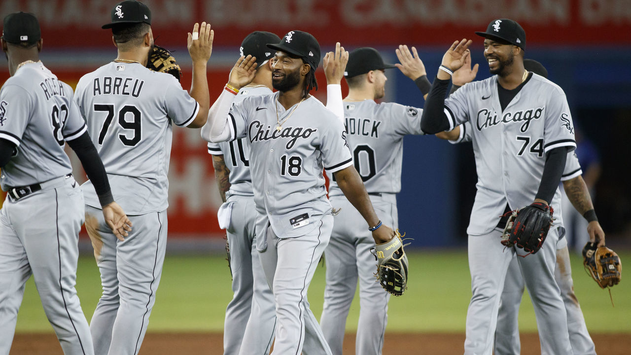 TORONTO, ON - AUGUST 24: Brian Goodwin #18 of the Chicago White Sox and Eloy Jimenez #74 celebrate with teammates after their MLB game victory over the Toronto Blue Jay at Rogers Centre on August 24, 2021 in Toronto, Ontario.