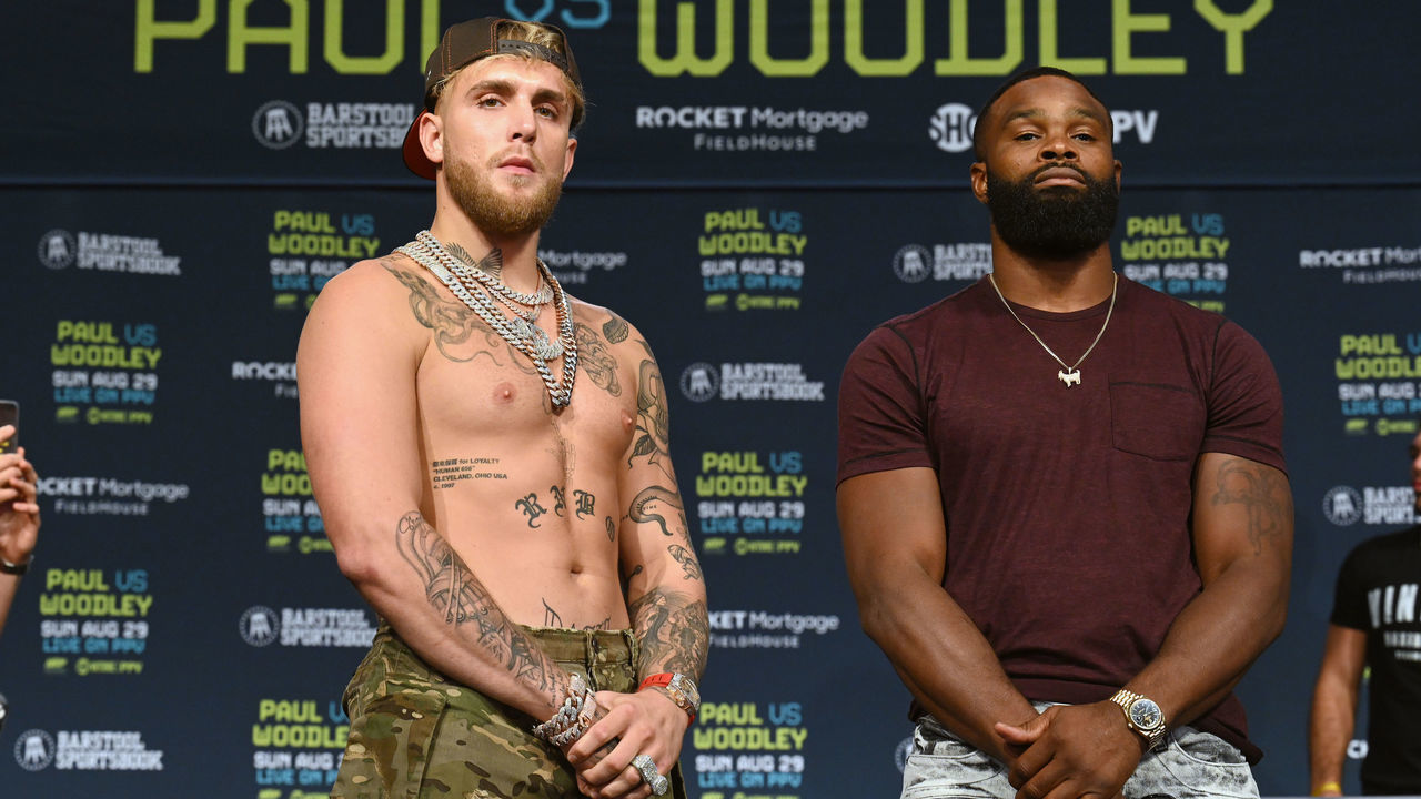 CLEVELAND, OHIO - AUGUST 26: Jake Paul and Tyron Woodley pose during a press conference at the Hilton Cleveland Downtown prior to their August 29 fight on August 26, 2021 in Cleveland, Ohio.