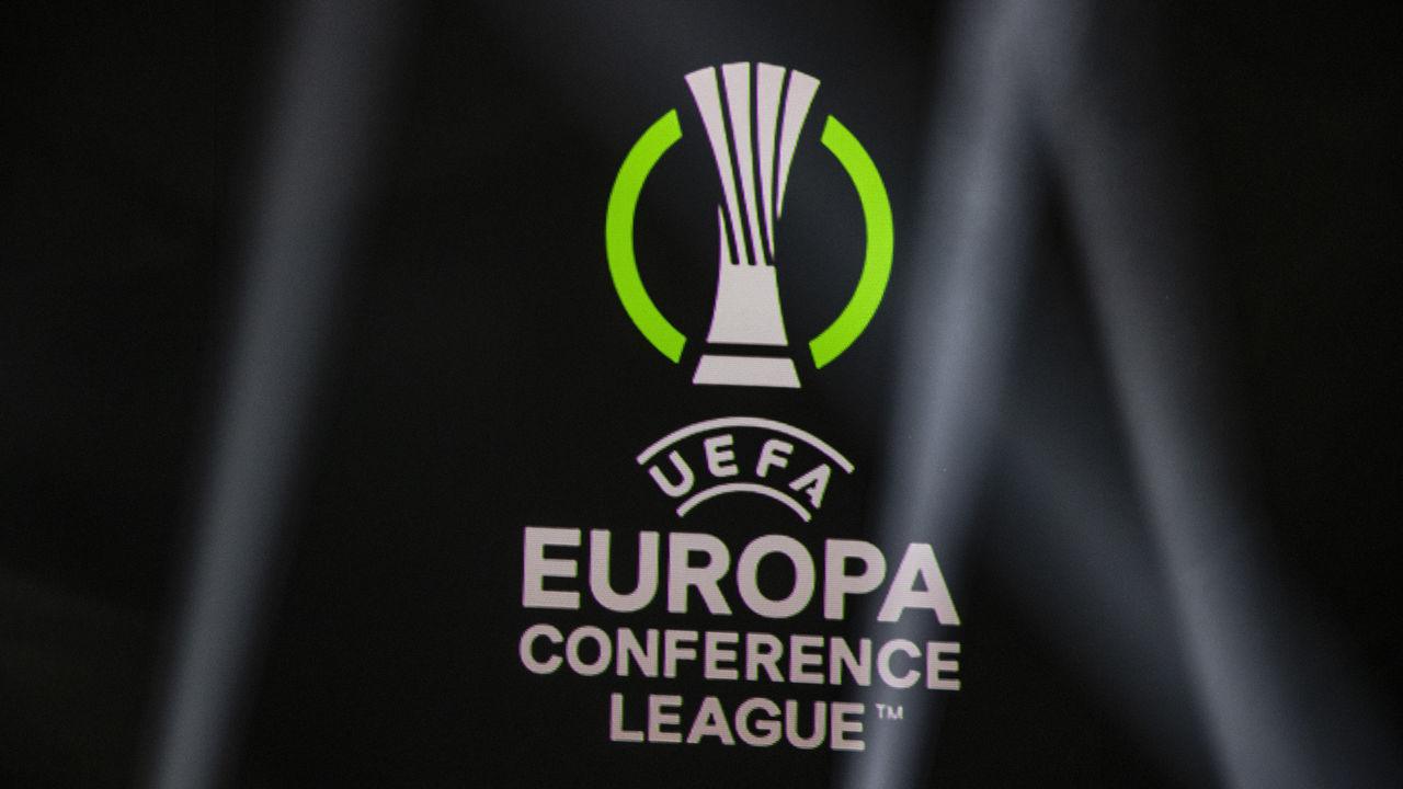 ISTANBUL, TURKEY - AUGUST 27: A screen shows the logo of UEFA Europa Conference League during the group stage draw at Halic Congress Center in Istanbul, Turkey on August 27, 2021.