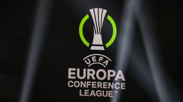 ISTANBUL, TURKEY - AUGUST 27: A screen shows the logo of UEFA Europa Conference League during the group stage draw at Halic Congress Center in Istanbul, Turkey on August 27, 2021.