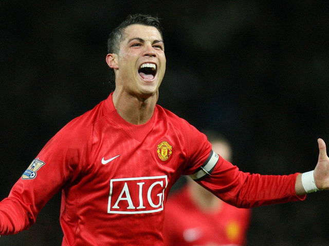 Manchester United's Cristiano Ronaldo celebrates his second goal during the Barclays Premier League match at Old Trafford, Manchester.