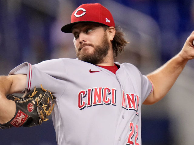 MIAMI, FLORIDA - AUGUST 27: Wade Miley #22 of the Cincinnati Reds delivers a pitch in the second inning against the Miami Marlins at loanDepot park on August 27, 2021 in Miami, Florida.