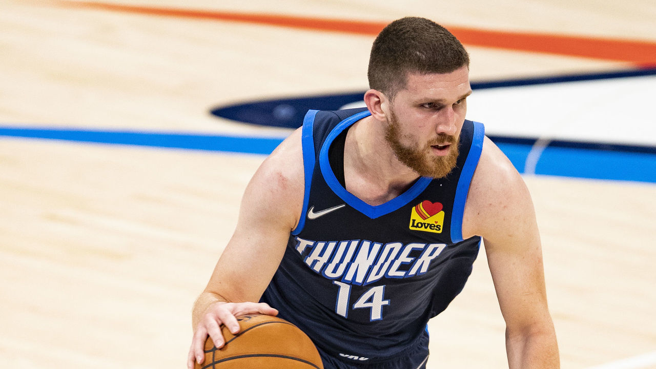 OKLAHOMA CITY, OKLAHOMA - MAY 14: Svi Mykhailiuk #14 of the Oklahoma City Thunder drives to the basket during a game against the Utah Jazz at Chesapeake Energy Arena on May 14, 2021 in Oklahoma City, Oklahoma. NOTE TO USER: User expressly acknowledges and agrees that, by downloading and or using this photograph, User is consenting to the terms and conditions of the Getty Images License Agreement.