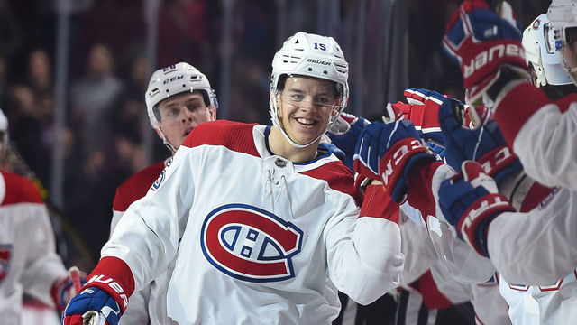 MONTREAL, QC - FEBRUARY 05: Montreal Canadiens center Jesperi Kotkaniemi (15) celebrates his goal with his teammates at the bench during the Anaheim Ducks versus the Montreal Canadiens game on February 05, 2019, at Bell Centre in Montreal, QC