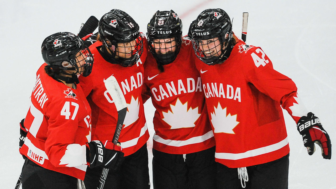 CALGARY, AB - AUGUST 20: Erin Ambrose #23 of Canada (2nd from R) celebrates with her teammates after scoring against Finland in the 2021 IIHF Women's World Championship Group A match played at WinSport Arena on August 20, 2021 in Calgary, Canada.