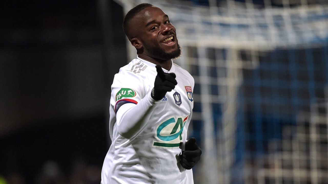 Lyon's Ivorian forward Maxwel Cornet celebrates after scoring a goal during the French Cup round of 64 football match between Bourg-en-Bresse (FBBP) and Lyon (OL) on January 4, 2020 at the Stade Marcel-Verchere Stadium in Bourg-en-Bresse.