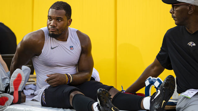 LANDOVER, MD - AUGUST 28: J.K. Dobbins #27 of the Baltimore Ravens is carted off the sidelines after being injured against the Washington Football Team during the first half of a preseason game at FedExField on August 28, 2021 in Landover, Maryland. J.K. Dobbins would be injured on the play.