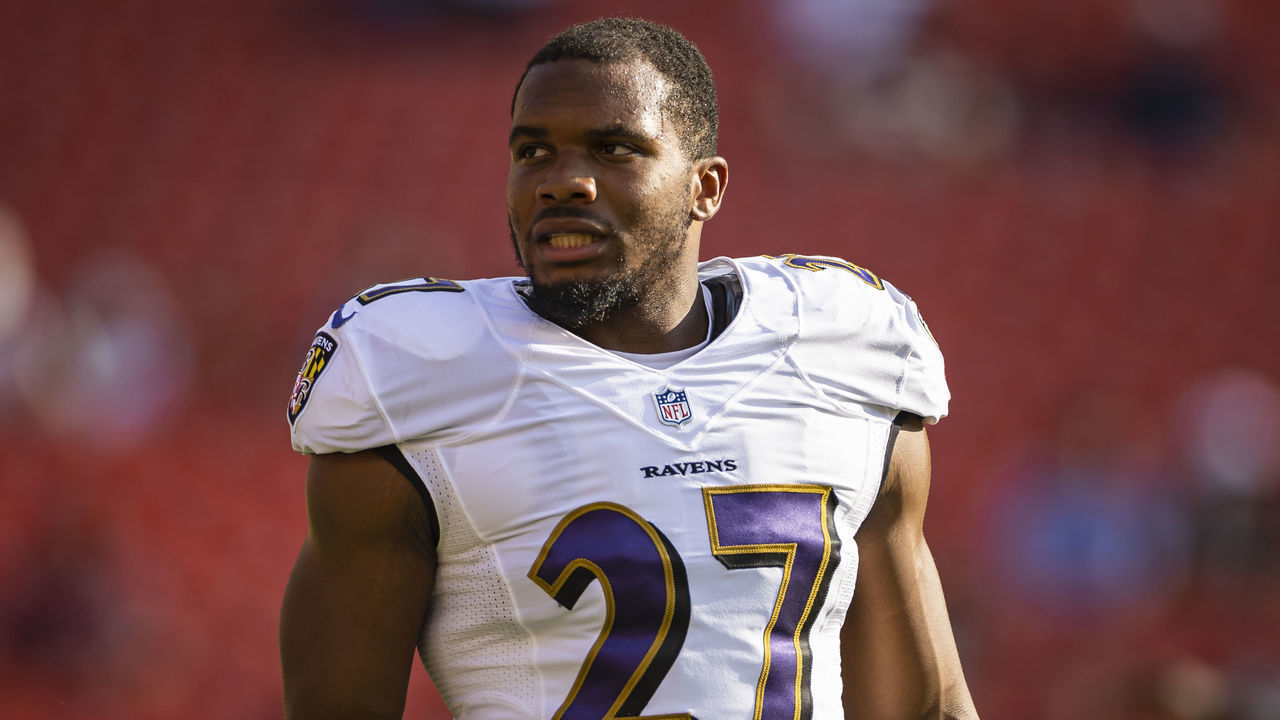 LANDOVER, MD - AUGUST 28: J.K. Dobbins #27 of the Baltimore Ravens looks on before the preseason game against the Washington Football Team at FedExField on August 28, 2021 in Landover, Maryland.