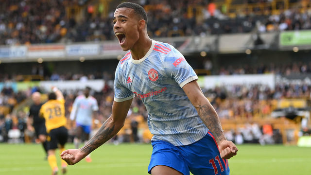 WOLVERHAMPTON, ENGLAND - AUGUST 29: Mason Greenwood of Manchester United celebrates after scoring their sides first goal during the Premier League match between Wolverhampton Wanderers and Manchester United at Molineux on August 29, 2021 in Wolverhampton, England.