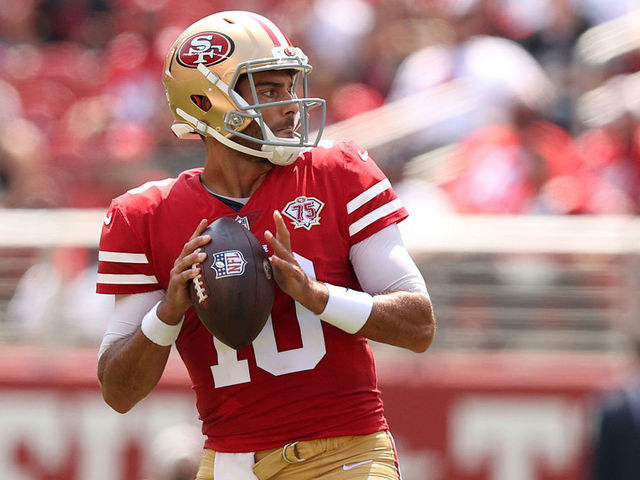 Jimmy Garoppolo of the Las Vegas Raiders signals to the sideline News  Photo - Getty Images