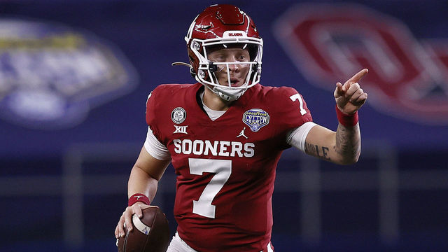 ARLINGTON, TEXAS - DECEMBER 30: Quarterback Spencer Rattler #7 of the Oklahoma Sooners scrambles against the Florida Gators during the second quarter at AT&T Stadium on December 30, 2020 in Arlington, Texas.