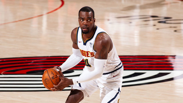 PORTLAND, OR - JUNE 3: Paul Millsap #4 of the Denver Nuggets handles the ball during the game against the Portland Trail Blazers during Round 1, Game 6 of the 2021 NBA Playoffs on June 3, 2021 at the Moda Center Arena in Portland, Oregon. Mandatory Copyright Notice: Copyright 2021 NBAE