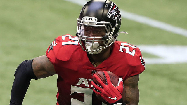 ATLANTA, GA - OCTOBER 25: Running back Todd Gurley (21) of the Atlanta Falcons rushes during the week 7 NFL game between the Atlanta Falcons and the Detroit Lions on October 25, 2020 at Mercedes-Benz Stadium in Atlanta, Georgia.