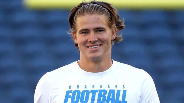 SEATTLE, WASHINGTON - AUGUST 28: Justin Herbert #10 of the Los Angeles Chargers warms up before the NFL preseason game against the Seattle Seahawks at Lumen Field on August 28, 2021 in Seattle, Washington.