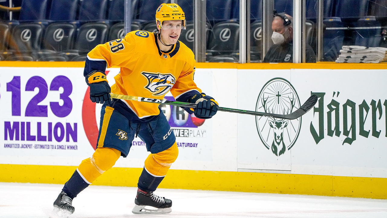 NASHVILLE, TN - FEBRUARY 28: Eeli Tolvanen #28 of the Nashville Predators skates against the Columbus Blue Jackets at Bridgestone Arena on February 28, 2021 in Nashville, Tennessee.