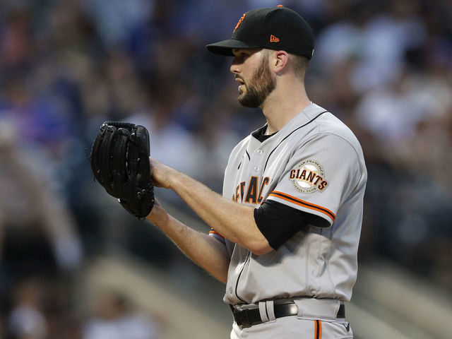 NEW YORK, NEW YORK - AUGUST 26: Alex Wood #57 of the San Francisco Giants in action against the New York Mets at Citi Field on August 26, 2021 in New York City. The Giants defeated the Mets 3-2.