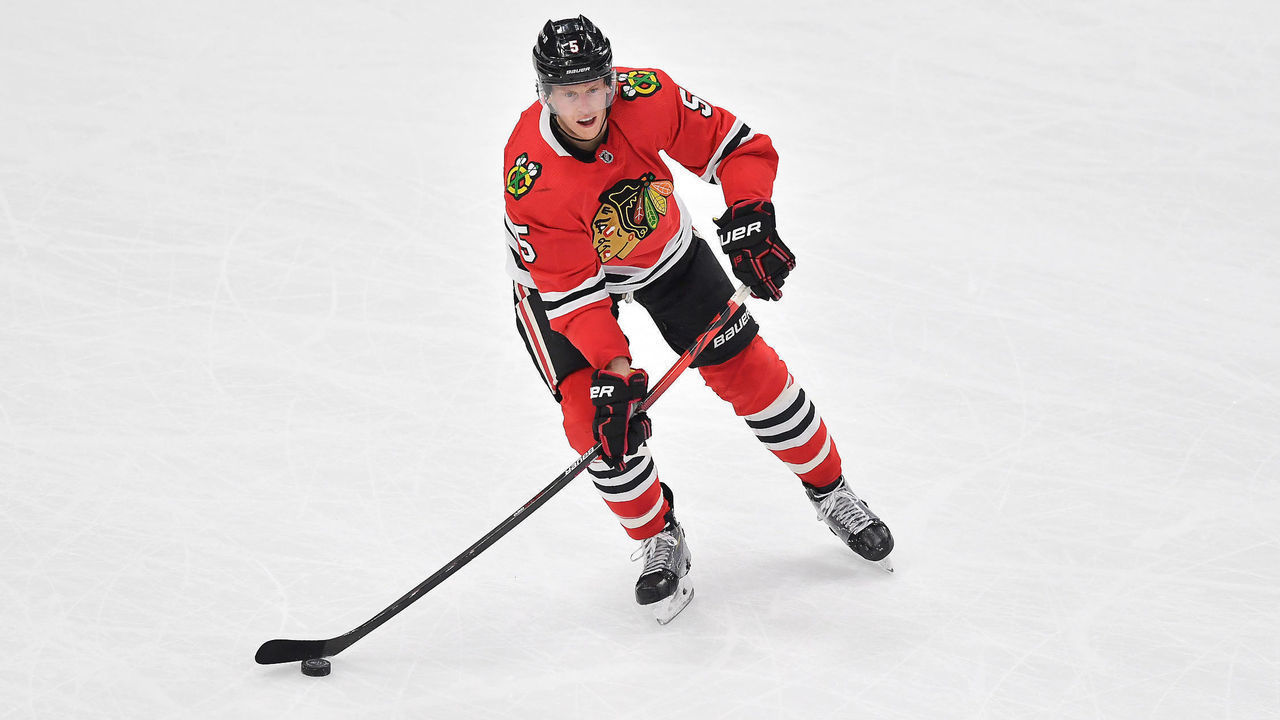 CHICAGO, IL - APRIL 21: Chicago Blackhawks defenseman Connor Murphy (5) skates with the puck in action during a game between the Nashville Predators and the Chicago Blackhawks on April 21, 2021 at the United Center in Chicago, IL.