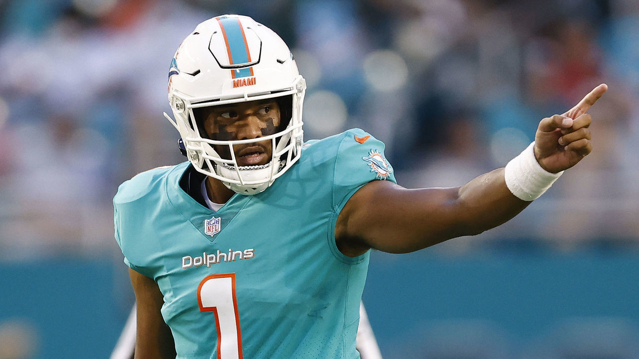 MIAMI GARDENS, FLORIDA - AUGUST 21: Tua Tagovailoa #1 of the Miami Dolphins motions to the offense against the Atlanta Falcons during a preseason game at Hard Rock Stadium on August 21, 2021 in Miami Gardens, Florida.