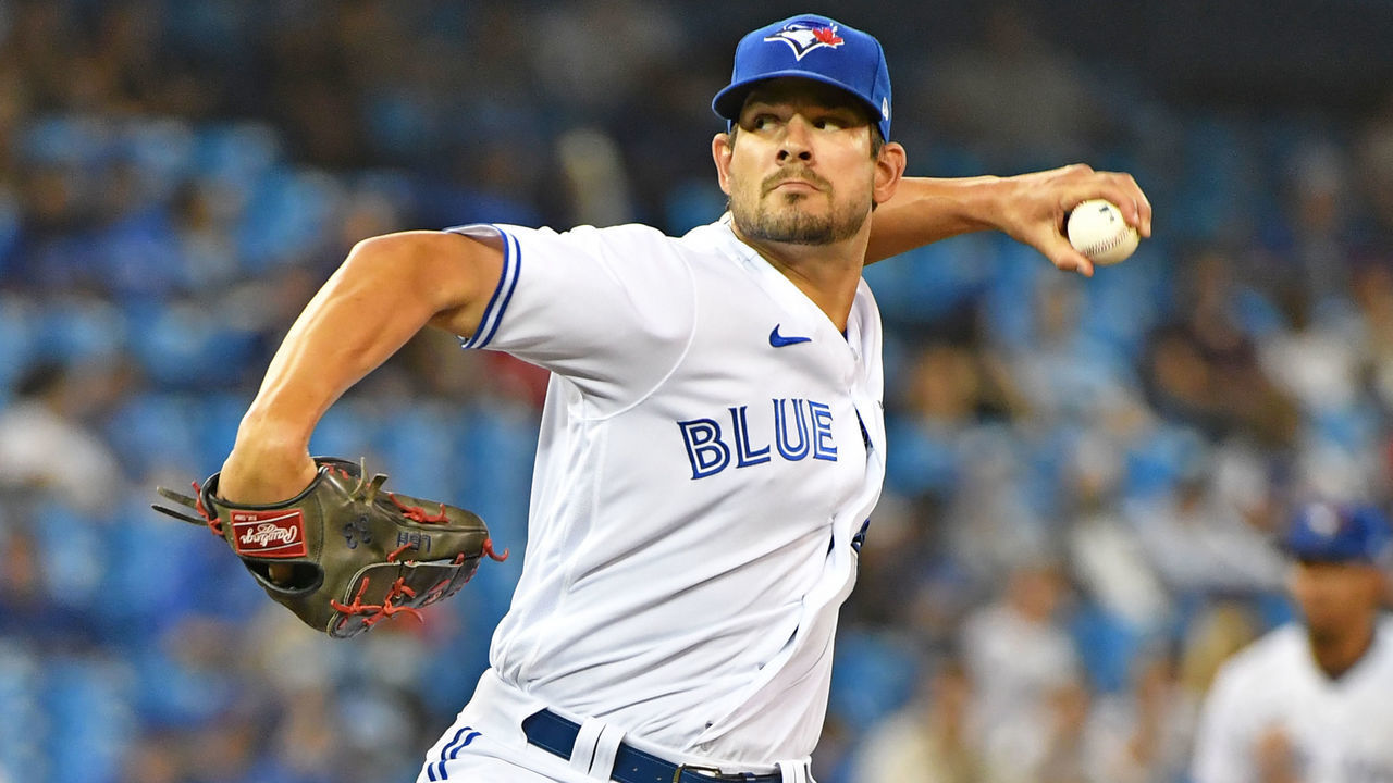 TORONTO, ON - AUGUST 24: Toronto Blue Jays Pitcher Brad Hand (52) pitches during the regular season MLB game between the Chicago White Sox and Toronto Blue Jays on August 24, 2021 at Rogers Centre in Toronto, ON.
