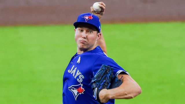 HOUSTON, TX - MAY 09: Toronto Blue Jays starting pitcher Nate Pearson (24) delivers a pitch during the baseball game between the Toronto Blue Jays and Houston Astros at Minute Maid Park on May 9, 2021 in Houston, Texas.