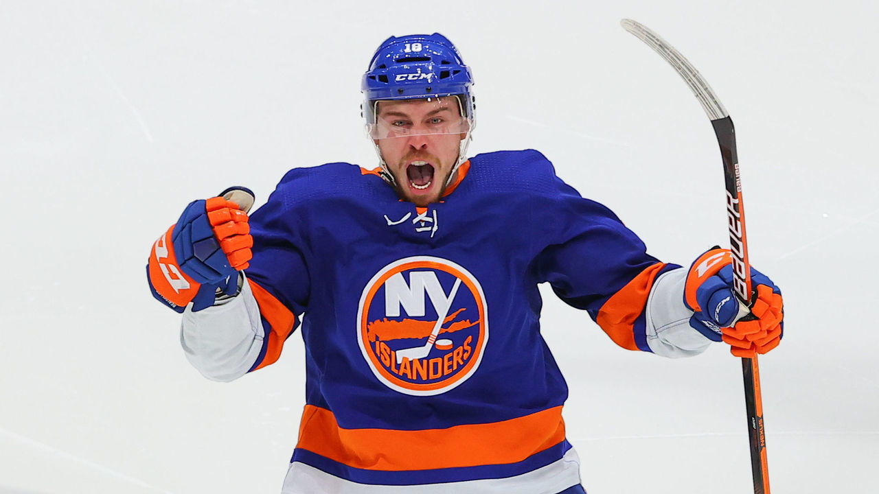 UNIONDALE, NY - JUNE 23: New York Islanders left wing Anthony Beauvillier (18) celebrates after scoring the game winning goal during game 6 of the Stanley Cup Playoffs Semifinals game between the New York Islanders and the Tampa Bay Lightning on June 23, 2021 at the Nassau Veterans Memorial Coliseum in Uniondale, NY.