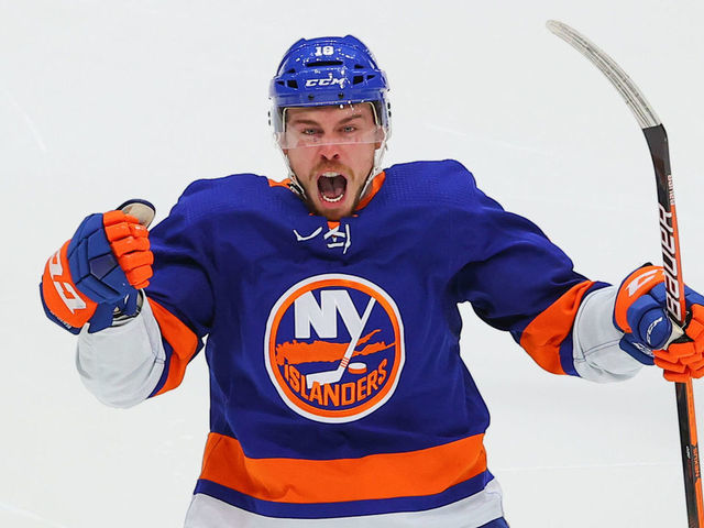 UNIONDALE, NY - JUNE 23: New York Islanders left wing Anthony Beauvillier (18) celebrates after scoring the game winning goal during game 6 of the Stanley Cup Playoffs Semifinals game between the New York Islanders and the Tampa Bay Lightning on June 23, 2021 at the Nassau Veterans Memorial Coliseum in Uniondale, NY.