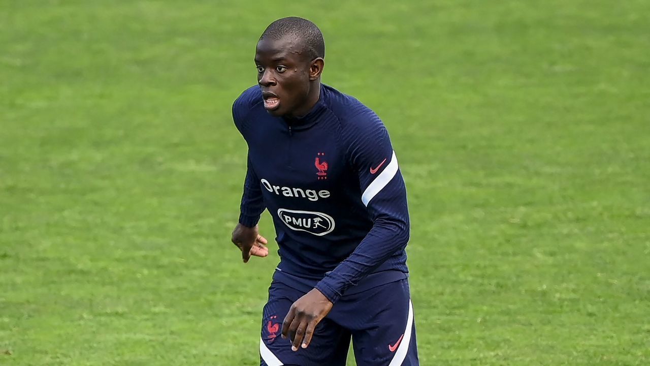France's midfielder N'Golo Kante runs with the ball during a training session in Clairefontaine-en-Yvelines on June 5, 2021 as part of the team's preparation for the upcoming 2020 EUFA Euro football tournament. - France will play a friendly football match against Bulgaria on June 8 as part of the team's Euro 2020 preparation.