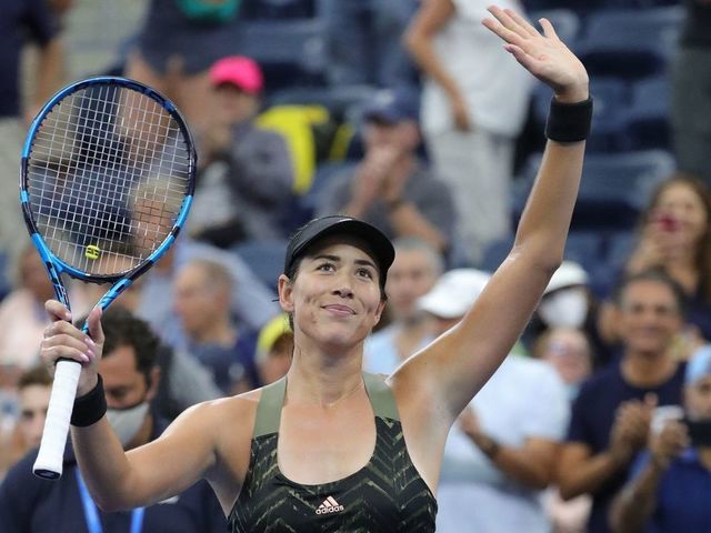 Spain's Garbine Muguruza celebrates her defeat of Germany's Andrea Petkovic during their 2021 US Open Tennis tournament women's singles second round match at the USTA Billie Jean King National Tennis Center in New York, on September 1, 2021.