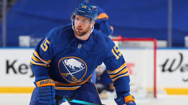 BUFFALO, NY - APRIL 20: Riley Sheahan #15 of the Buffalo Sabres skates against the Boston Bruins during an NHL game on April 20, 2021 at KeyBank Center in Buffalo, New York.
