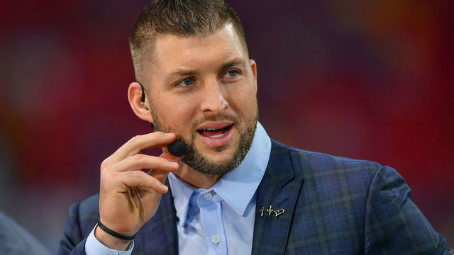 ATLANTA, GA - DECEMBER 28: ESPN football analyst and Heisman Trophy winner Tim Tebow during the College Football Playoff Semifinal game between the LSU Tigers and the Oklahoma Sooners on December 28th, 2019 at the Chick-fil-A Peach Bowl in Mercedes-Benz Stadium in Atlanta, GA.