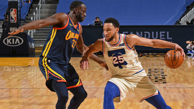 SAN FRANCISCO, CA - MARCH 23:Ben Simmons #25 of the Philadelphia 76ers dribbles the ball while Draymond Green #23 of the Golden State Warriors plays defense on March 23, 2021 at Chase Center in San Francisco, California. NOTE TO USER: User expressly acknowledges and agrees that, by downloading and or using this photograph, user is consenting to the terms and conditions of Getty Images License Agreement. Mandatory Copyright Notice: Copyright 2021 NBAE